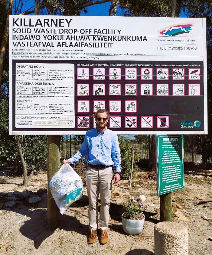 SES team member John delivering recyclable material to COCT drop-off site